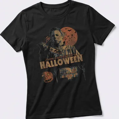 Vintage distressed Halloween t-shirt featuring Michael Myers and classic horror film text — printed on a women's shirt