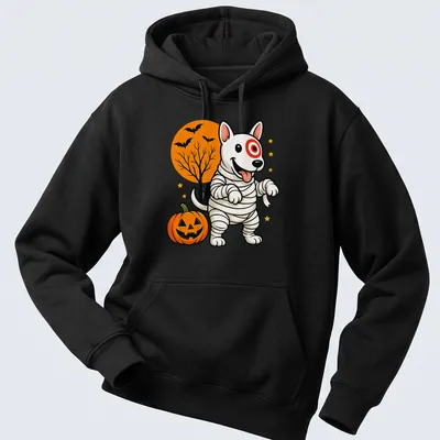 Cartoonish mummy dog in Halloween colors of orange, black, white, green, and yellow — printed on a unisex hoodie