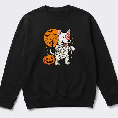 Cartoonish mummy dog in Halloween colors of orange, black, white, green, and yellow — printed on a unisex sweatshirt