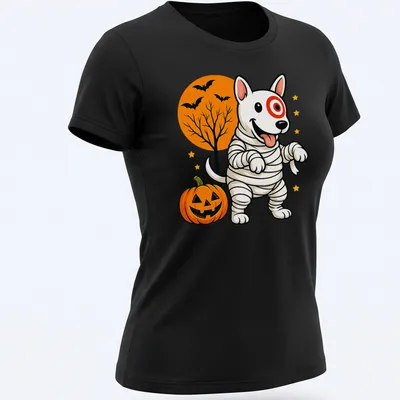 Cartoonish mummy dog in Halloween colors of orange, black, white, green, and yellow — printed on a women's shirt