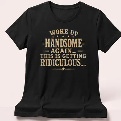 Vintage distressed shirt featuring humorous text about waking up handsome — printed on a women's shirt