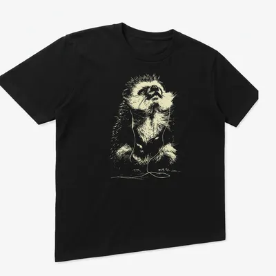 Minimal line art of a hedgehog with earbuds listening to music in light beige and white. — printed on a unisex t-shirt (angled view)