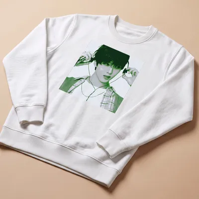 Pop art design featuring Jisung listening to music in green and black tones — printed on a unisex sweatshirt