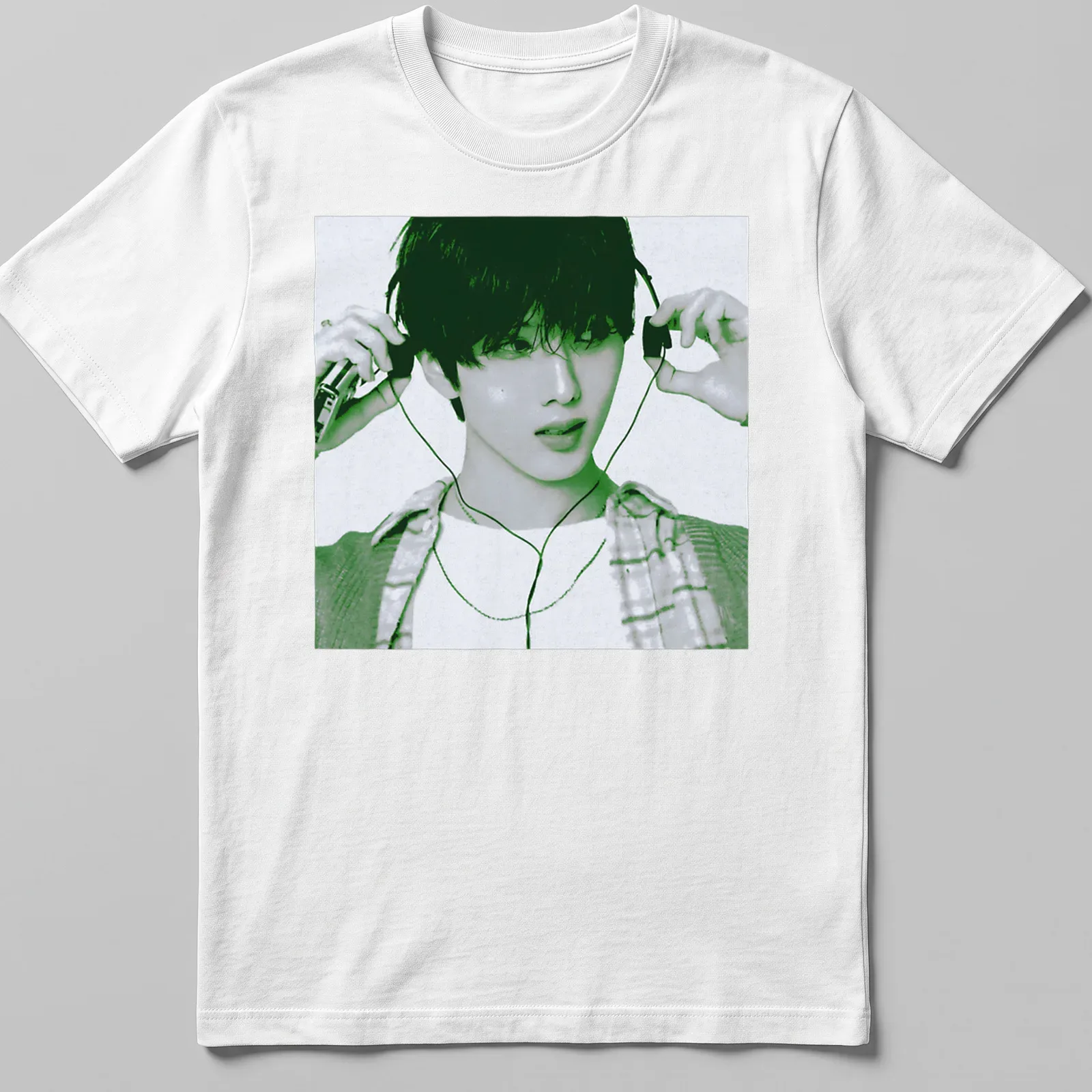 Pop art design featuring Jisung listening to music in green and black tones — printed on a unisex t-shirt
