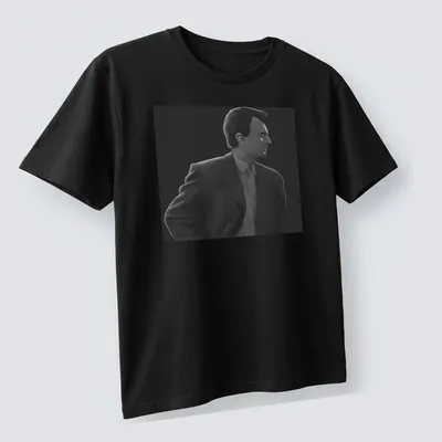 Monochrome illustration of a man in a suit in black, white, and gray — printed on a unisex t-shirt (angled view)