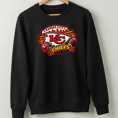 Bold Kansas City Chiefs fan t-shirt featuring established date and team logo — printed on a unisex sweatshirt