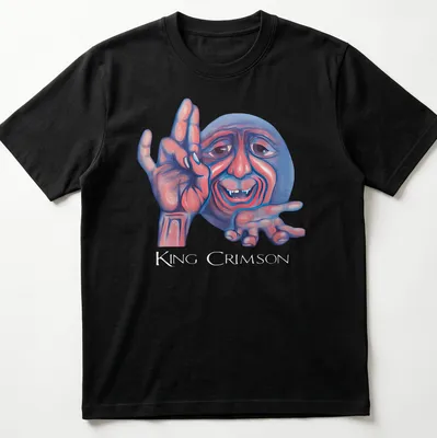 Colorful illustration of a smiling character with King Crimson text above