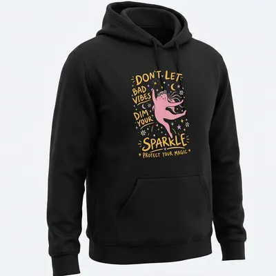 Playful cartoon t-shirt featuring a magic character with vibrant colors and positive text — printed on a unisex hoodie