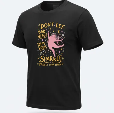 Playful cartoon t-shirt featuring a magic character with vibrant colors and positive text