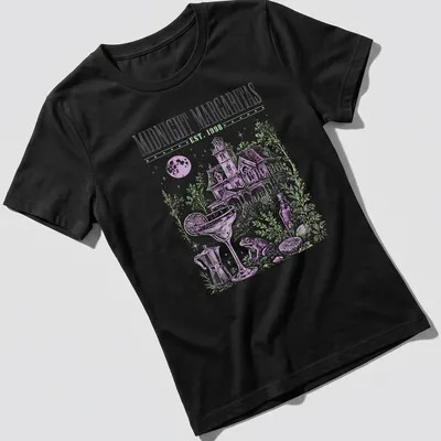 Vintage illustration of a haunted house with a margarita and Halloween text — printed on a women's shirt