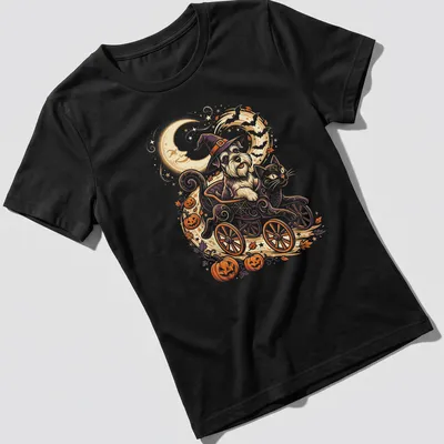 Whimsical illustration of a Mini Schnauzer and a cat in a cart for Halloween — printed on a women's shirt