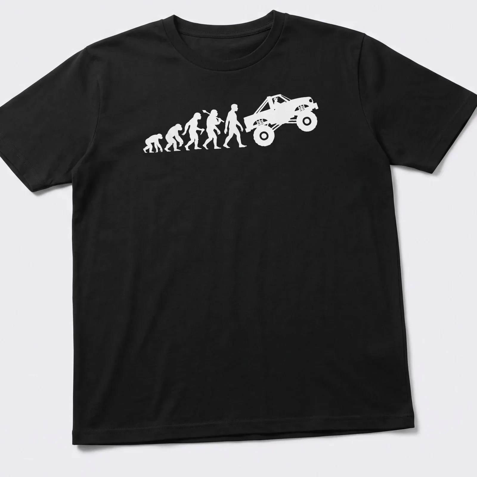 White illustrated evolution graphic of a monster truck — printed on a unisex t-shirt