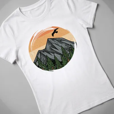 Vintage illustration of a mountain landscape with sunset colors in orange, gray, green, and brown. — printed on a women's shirt