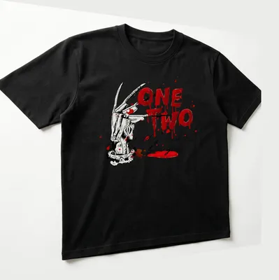 Illustration of a slasher glove with the text One Two Freddy's Coming For You in horror style — printed on a unisex t-shirt (angled view)