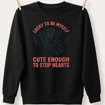 Kawaii nurse fairy t-shirt with playful text about hearts and luck — printed on a unisex sweatshirt