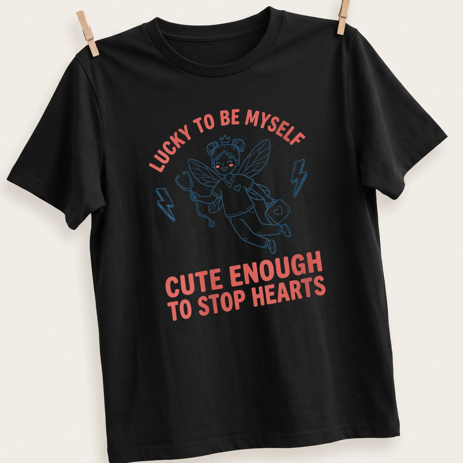 Kawaii nurse fairy t-shirt with playful text about hearts and luck — printed on a unisex t-shirt