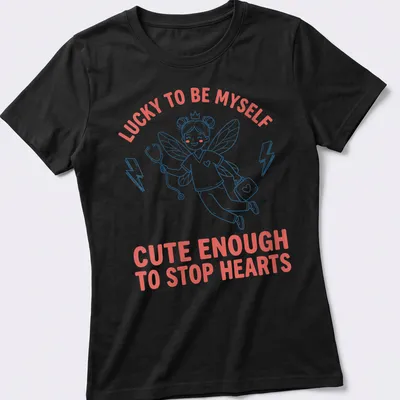 Kawaii nurse fairy t-shirt with playful text about hearts and luck — printed on a women's shirt