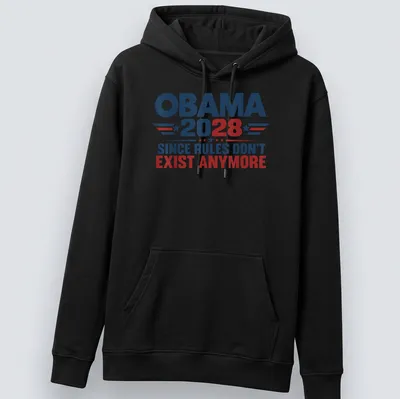 Bold political T-shirt featuring 'Obama 2028 Since Rules Don't Exist Anymore' in red, blue, and white typography — printed on a unisex hoodie
