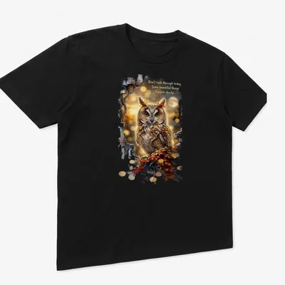 Detailed owl illustration with autumn leaves and inspirational text about taking time — printed on a unisex t-shirt (angled view)