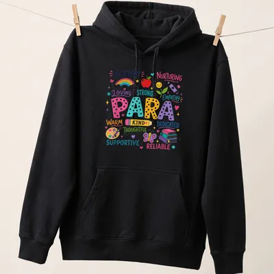 Colorful kawaii style text celebrating paraeducators' supportive roles — printed on a unisex hoodie