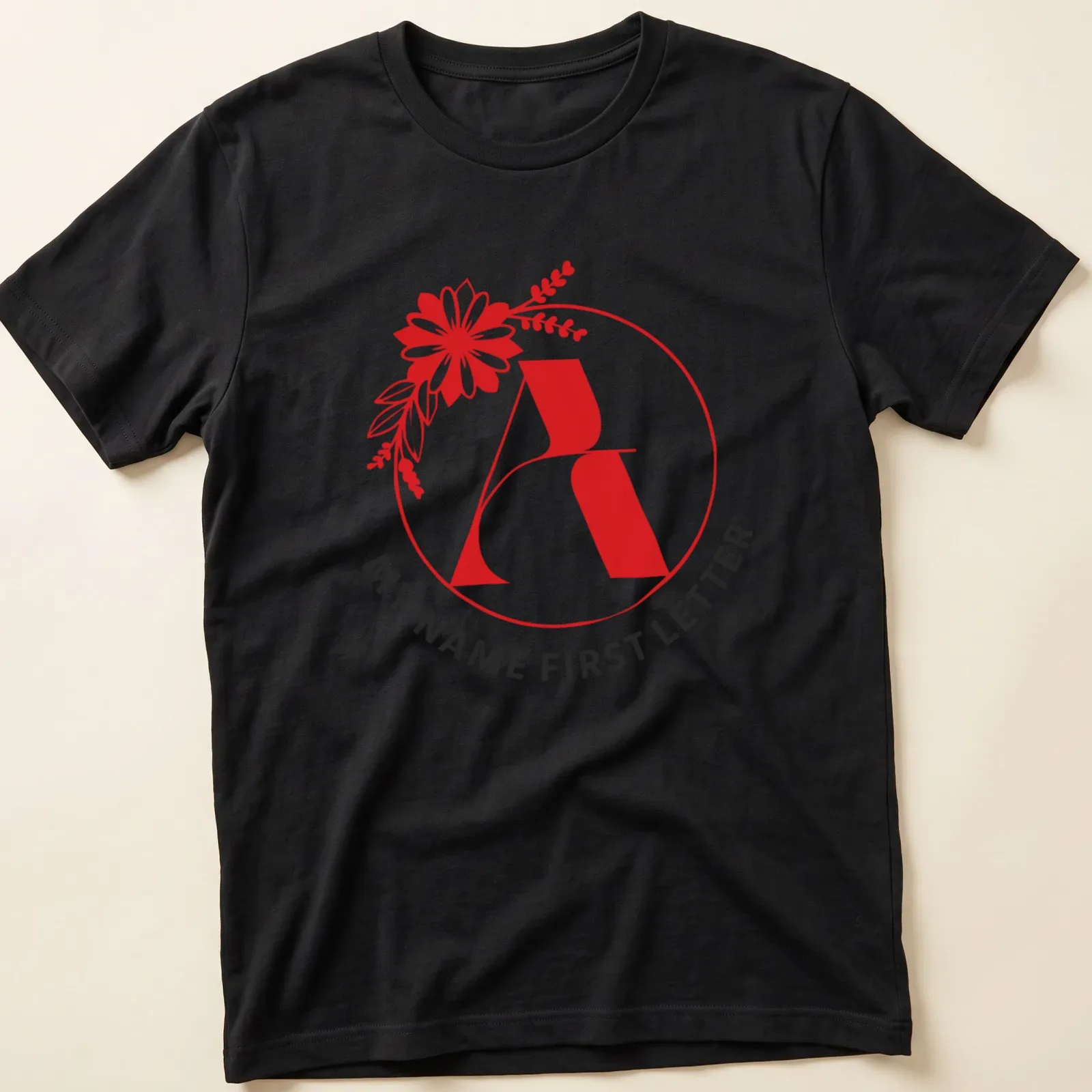 Floral initial letter print in modern typography with red, black, and white colors — printed on a unisex t-shirt