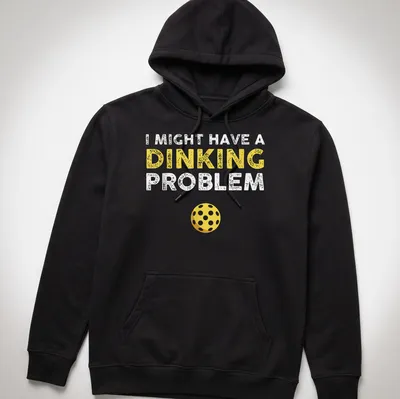 Funny pickleball shirt saying I Might Have A Dinking Problem in yellow and white — printed on a unisex hoodie