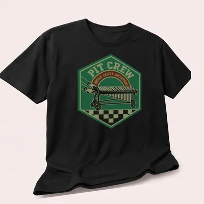 Vintage badge design of a pit crew with text: Pit Crew Unpaid Unseen Unstoppable — printed on a unisex t-shirt (angled view)