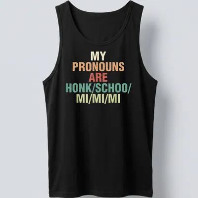 Colorful typography t-shirt with the phrase about pronouns in bold text — printed on a tank top