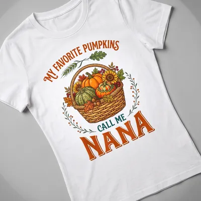 Vintage illustration tee featuring a basket of pumpkins with text about being a nana — printed on a women's shirt