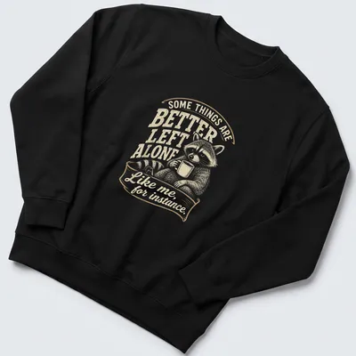 Vintage illustration of a raccoon with humorous text about solitude. — printed on a unisex sweatshirt