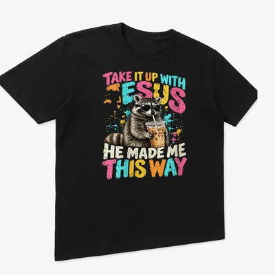 Cartoon raccoon wearing sunglasses with humorous text about faith. — printed on a unisex t-shirt (angled view)