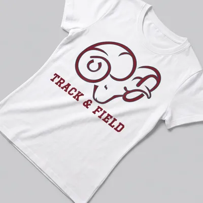 Bold graphic of ram with 'TRACK & FIELD' text on maroon and white — printed on a women's shirt