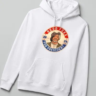 Retro T-shirt featuring Redd Foxx and 'Redd Foxx For President 2024' text. — printed on a unisex hoodie