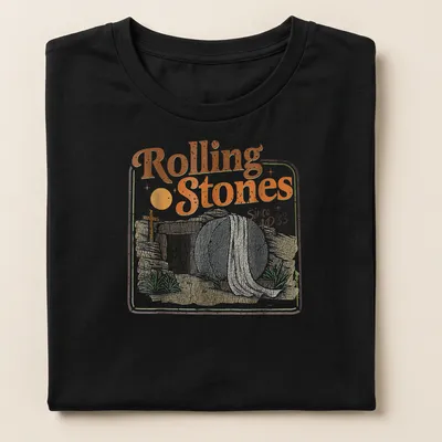 Retro t-shirt featuring the phrase Rolling Stones Since AD 33 above a tomb with a rolled stone — printed on a women's shirt