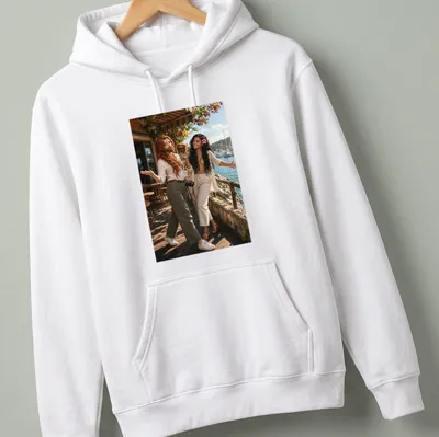 Realistic photo of Rowan Fletcher and Shanti Riveria on — printed on a unisex hoodie