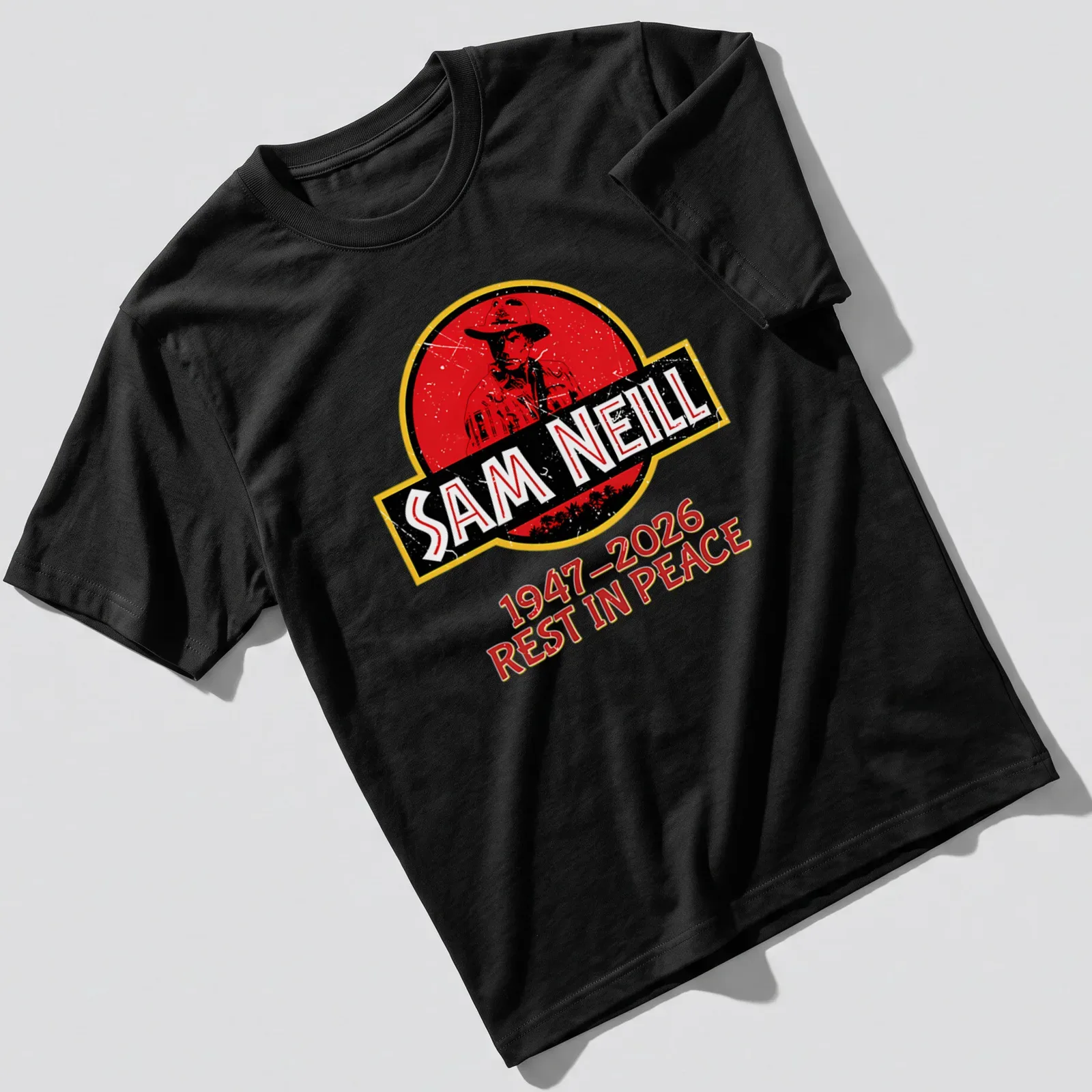 Vintage distressed tribute t-shirt with Sam Neill's name and dates. — printed on a unisex t-shirt