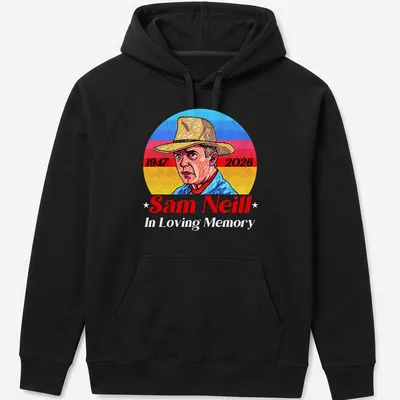 Vintage portrait tribute to Sam Neill with 1947 and 2026 dates in blue, red, yellow, and white. — printed on a unisex hoodie