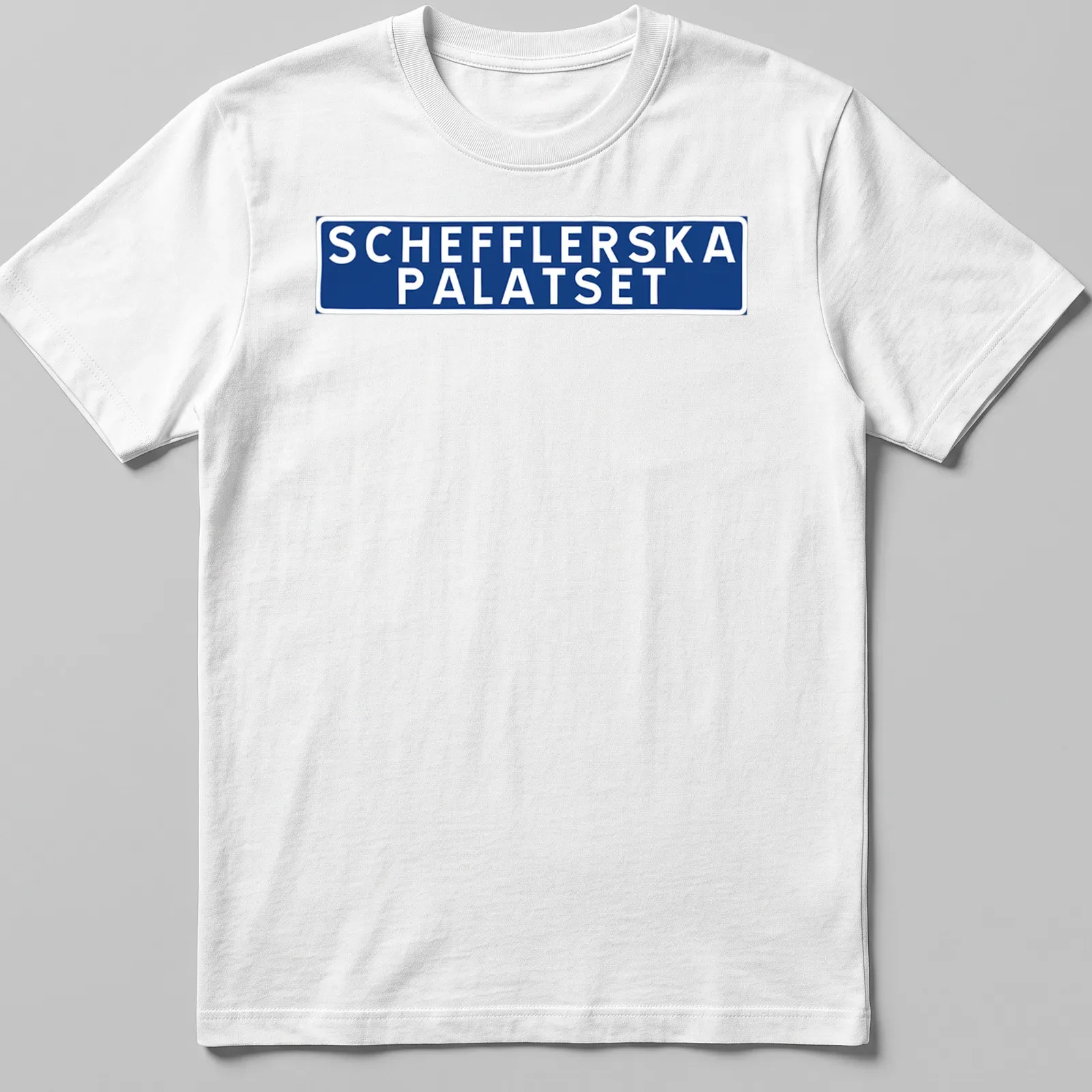Bold typography print of Schefflerska Palatset in blue and white — printed on a unisex t-shirt