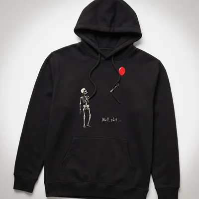 Gothic-style t-shirt featuring a skeleton holding a red balloon with humorous text. — printed on a unisex hoodie