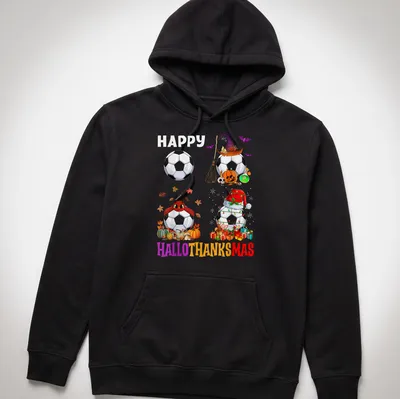 Colorful cartoon design with soccer ball and seasonal elements, saying Happy Hallothanksmas — printed on a unisex hoodie