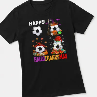 Colorful cartoon design with soccer ball and seasonal elements, saying Happy Hallothanksmas — printed on a women's shirt