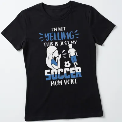 Playful bold graphic with text 'YELLING ABOUT SOCCER' for a soccer mom — printed on a women's shirt