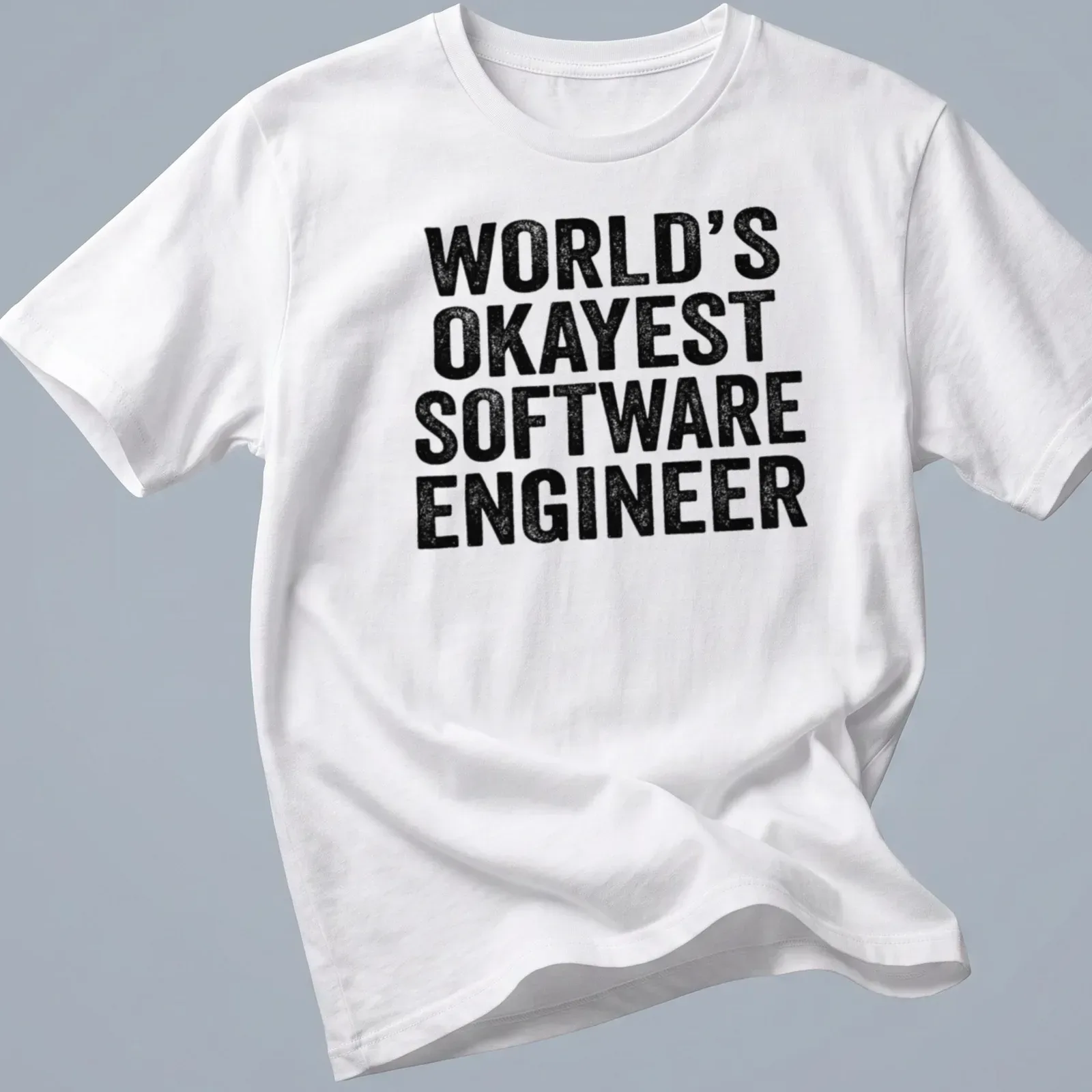 Distressed t-shirt featuring the text World's Okayest Software Engineer — printed on a unisex t-shirt