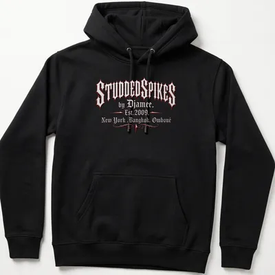 Old English text logo of Studded Spikes by Djamee in red, black, and white. — printed on a unisex hoodie