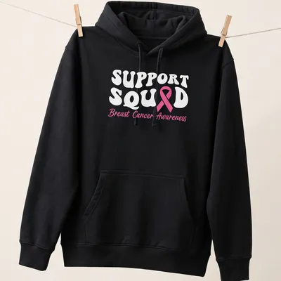 Cute pink ribbon graphic with Support Squad Breast Cancer Awareness text. — printed on a unisex hoodie