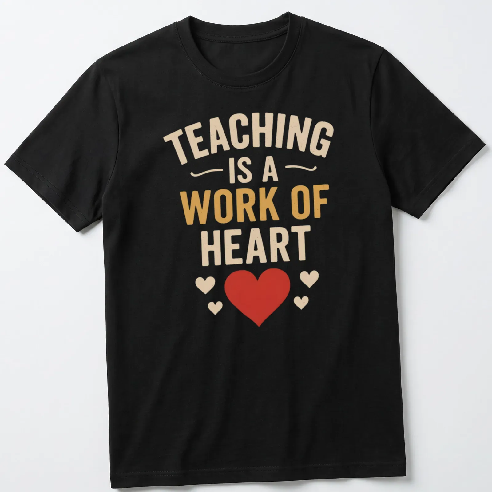Bold typography shirt with the quote 'Teaching Is A Work Of Heart' in colorful design — printed on a unisex t-shirt