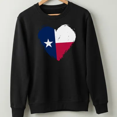 Distressed Texas flag heart T-shirt in blue, red, and white colors — printed on a unisex sweatshirt
