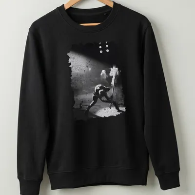 Black and white grunge T-shirt featuring The Clash in a punk rock style — printed on a unisex sweatshirt