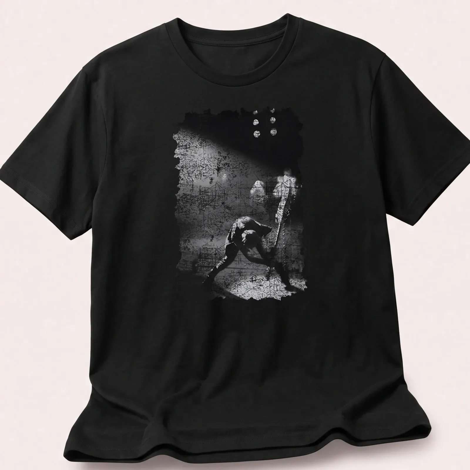 Black and white grunge T-shirt featuring The Clash in a punk rock style — printed on a unisex t-shirt