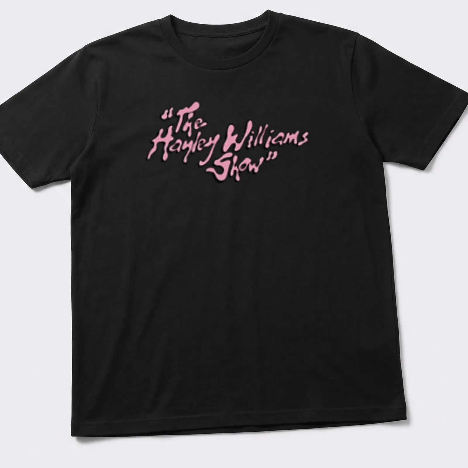 Playful script t-shirt featuring The Hayley Williams Show text in pink and white — printed on a unisex t-shirt